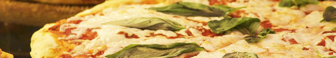 Eating Pizza at Sugar Wood-Fired Bistro restaurant in Peoria, IL.